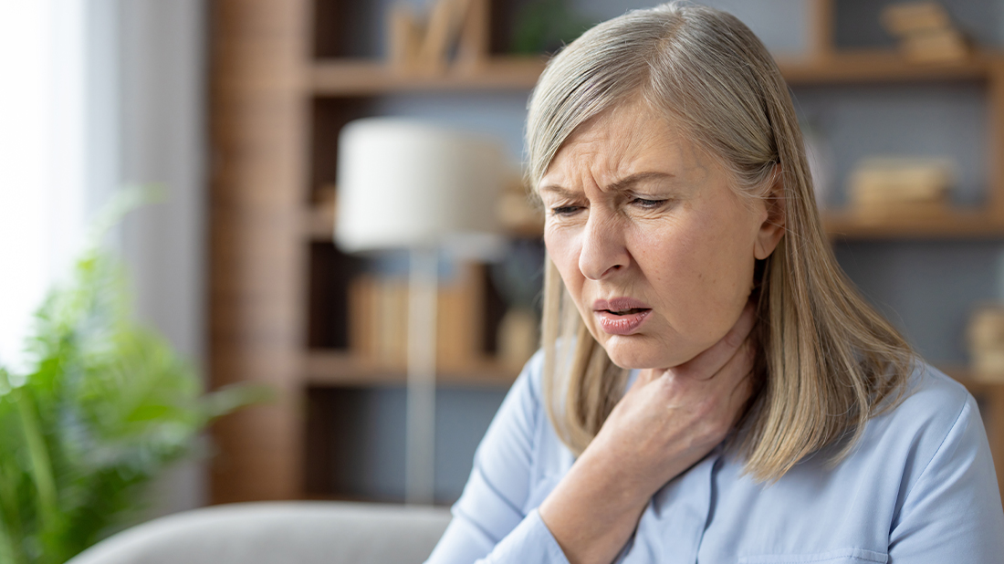 woman having trouble swallowing